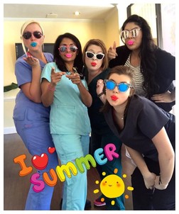Team members in summer sunglasses